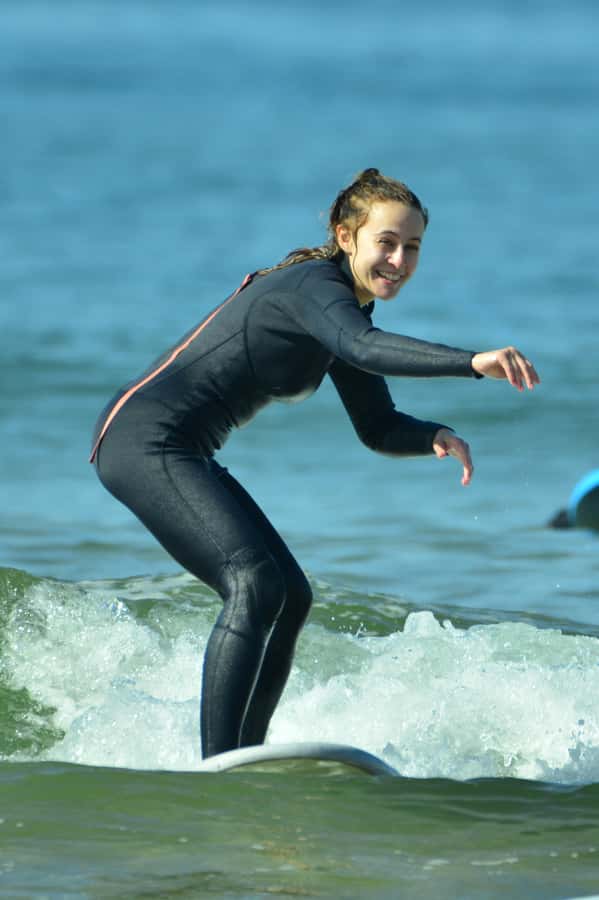 Agadir: Beginner Surf Lesson – Equipment Included - Catching your first wave and making small turns