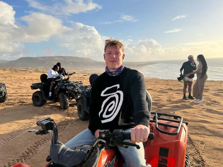 Agadir/Taghazout: Beach Quad Bike & Desert Sandboarding Tour - Quad biking beside the Atlantic