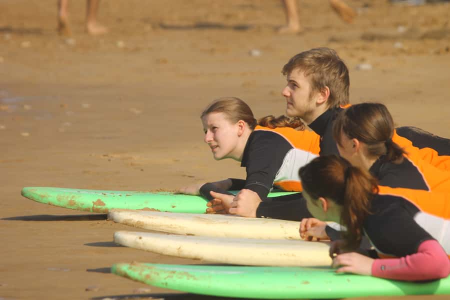 Agadir: Taghazout Beach Surf Lesson with Lunch and Transfer - What the $48 price really covers