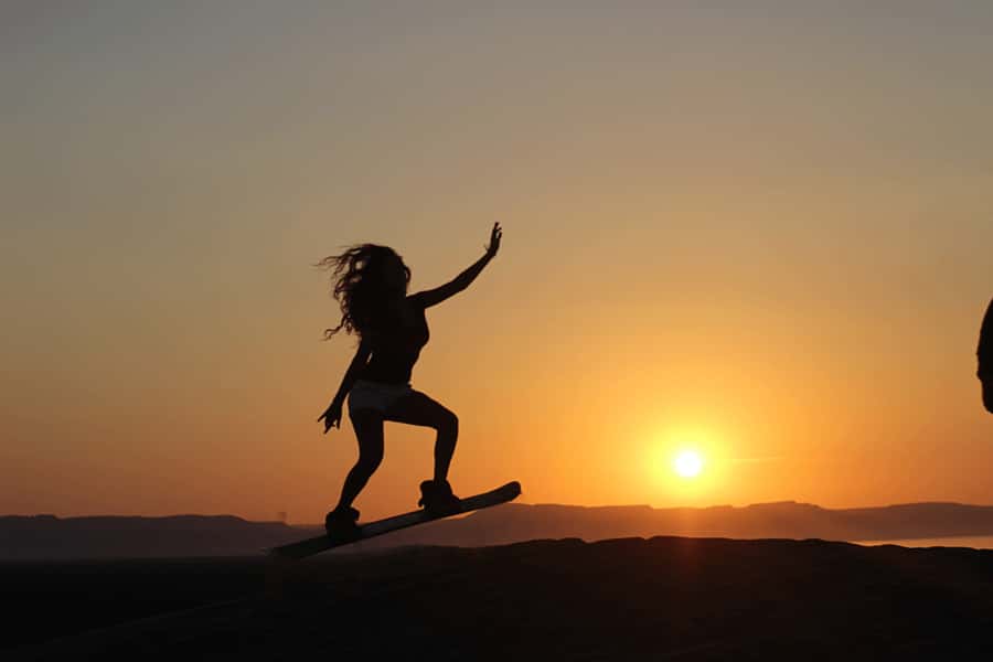 Agadir/Taghazout: Desert Sandboarding & Visit to the Canyon - Learning to sandboard on the coastal dunes