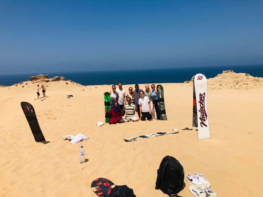 Agadir/Taghazout: Desert Sandboarding & Visit to the Canyon - Sunset from sand, sea, and desert