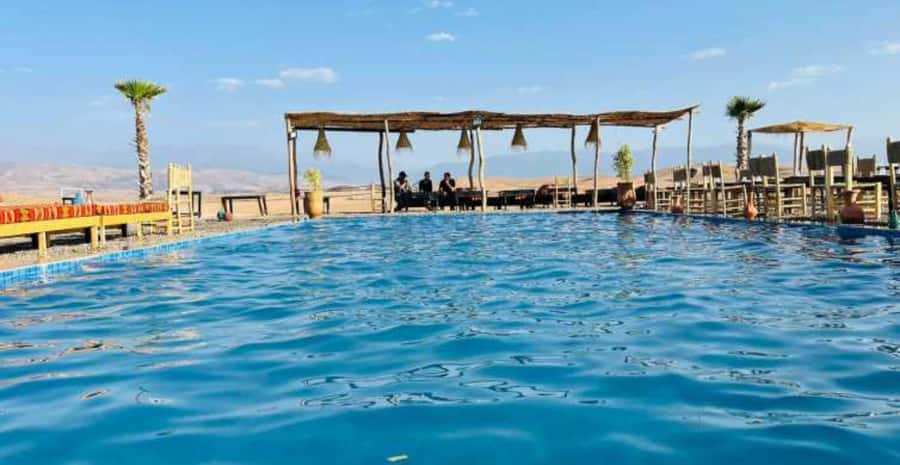 Agafay Desert Day: Quad Bike, Lunch & Swim Adventure - Quad biking on Agafay’s rocky tracks