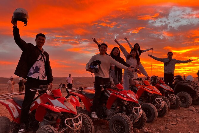 Agafay Desert Package: Quad Bike, Camel Ride, Dinner show - Quad biking toward the sunset
