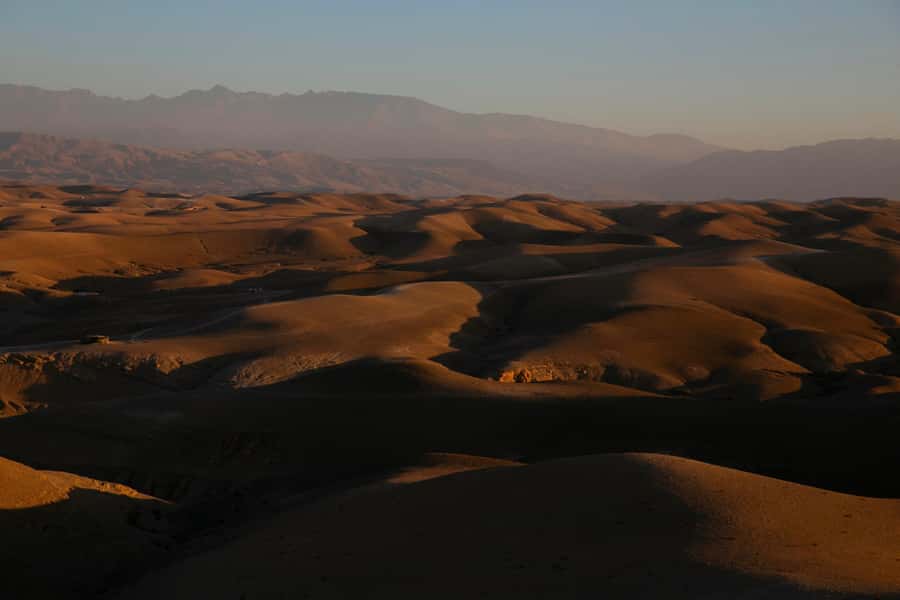 Agafay Tour: Sunset, Dinner, Camel ride, Quad and fire show - Sunset at the Agafay camp