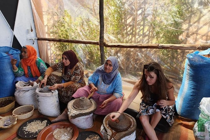 Atlas Mountains and Three Valleys & Waterfalls with Camel ride Guided Day Trip - Walking through the valleys toward a waterfall