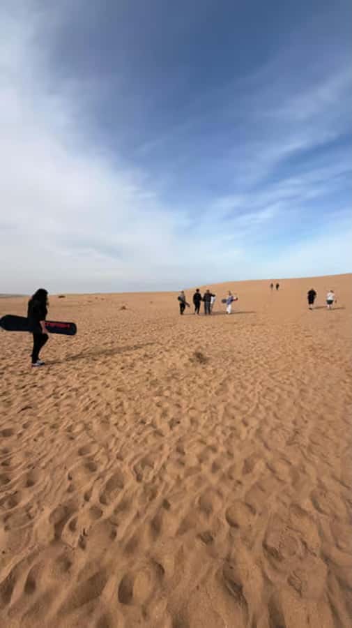 Best Agadir Desert Adventure: Quad Camel Sandboarding & BBQ - Quad biking across beach and mountain terrain