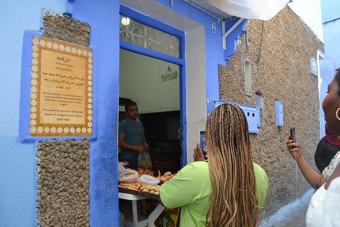Chefchaouen with Local Eyes Guided Walking Tour - Place El Haouta and a Moroccan tea break