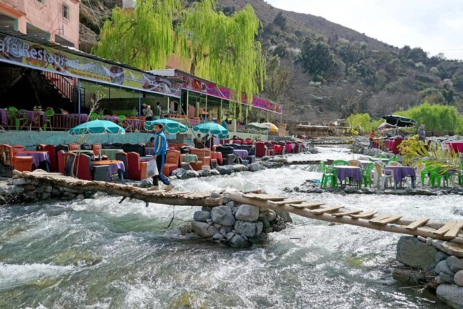 Day Trip from Marrakech Explore the Atlas Mountains and 4 Valleys - Asni: orchards, buildings, and community life