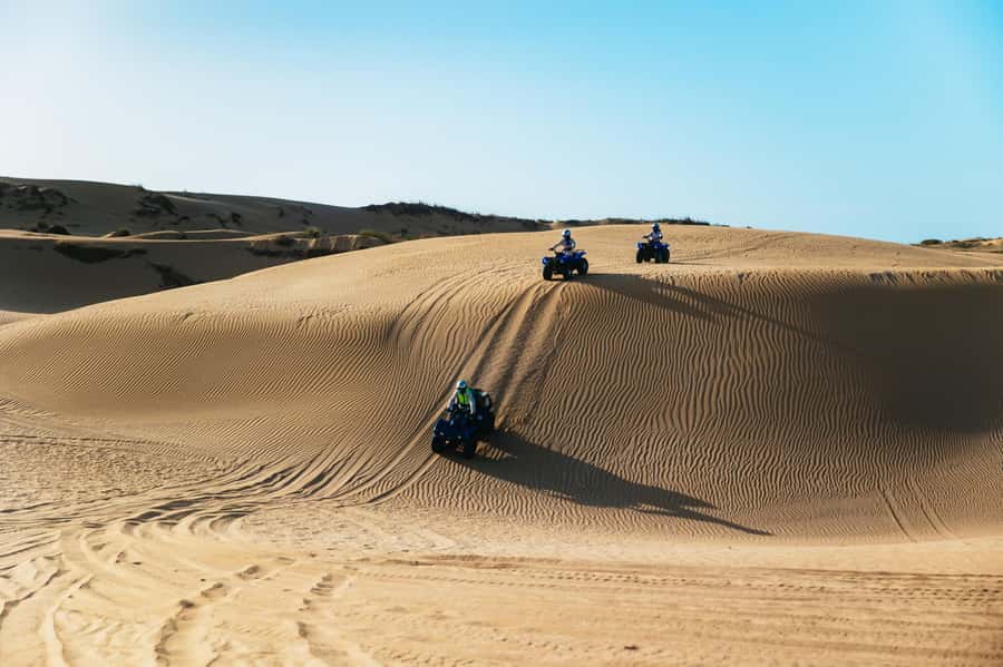 Essaouira Sand Dunes: Half Day Quad Bike Tour - Crossing Oued Ksob toward the Sultan’s Palace ruins