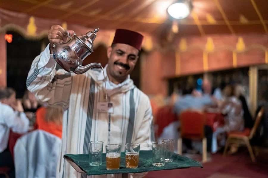 Fes : Unforgettable Dinner Show Experience with hotel pickup - Seven salads and two tagines at the table
