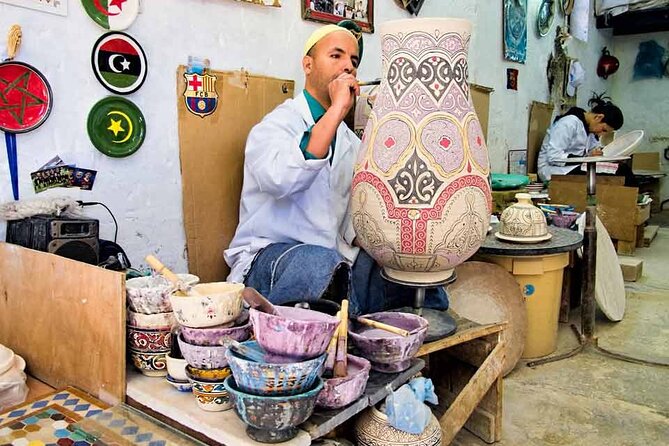 Fez Guided Tour of Artisans and Handicrafts Full-Day Private Tour - Bou Inania Madrasa and the first look at Fez