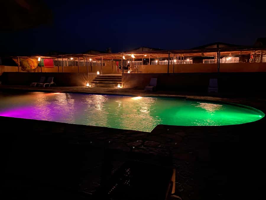 From Marrakech: Agafay Sunset Camel Tour with Dinner & Show - Dinner beneath the Berber tent