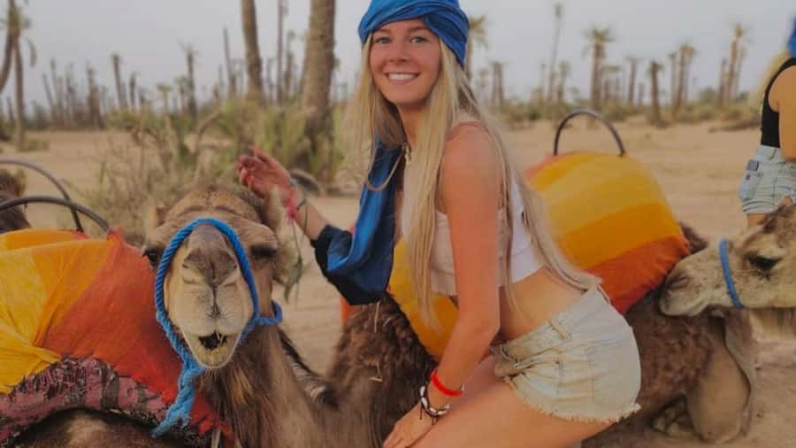 From Marrakech: Camel ride in the oasis palmeraie Grove - A Berber house visit with tea and fresh bread
