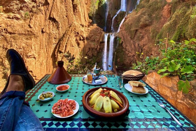 From Marrakech: Day Trip to Ouzoud Waterfalls Guided & Boat Ride - Barbary macaques beside the water