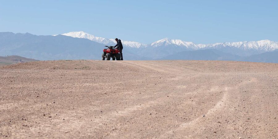From Marrakech: Guided Quad Biking Tour in Agafay Desert - Guides, communication, and group rhythm