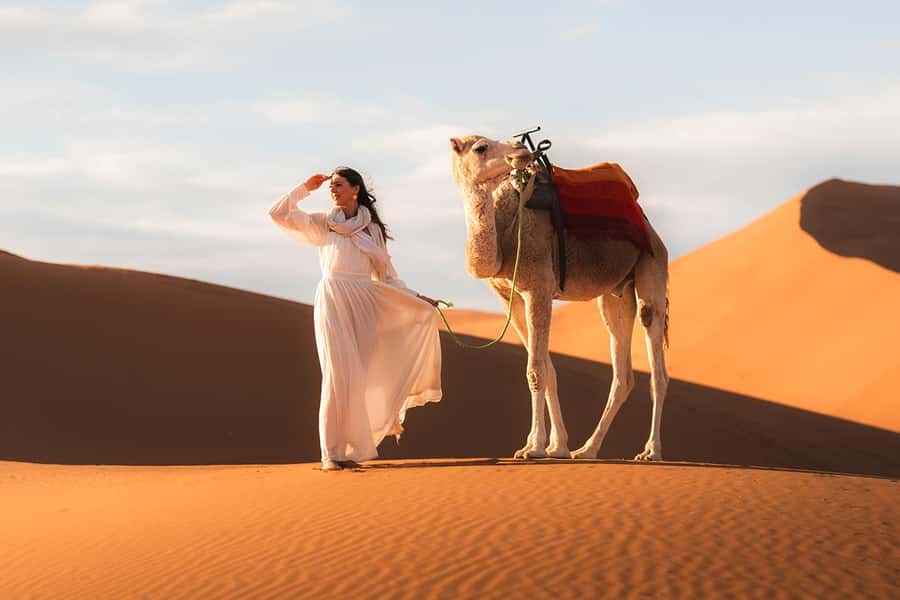 From Marrakech: Quad, Camel, & Dinner 3-Day Merzouga Tour - Sunset by camel across Erg Chebbi