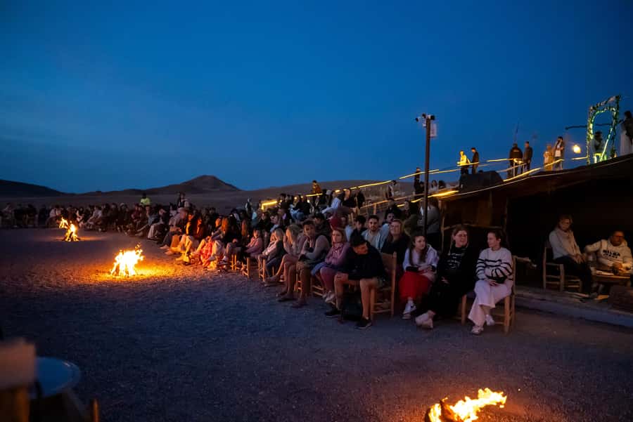 From Marrakech: Sunset Desert Tour with Camel Ride & Dinner - Berber music, dancing, and the fire show