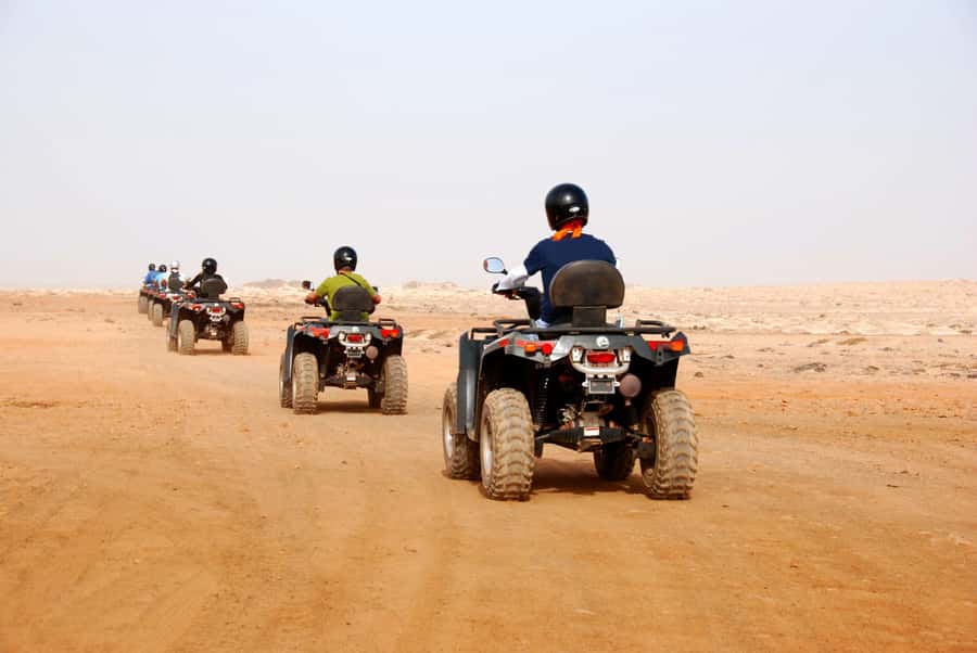 From Marrakesh: Agafay Desert Quad Biking, Camels & Dinner - One Hour on a Quad Through Rocky Desert Terrain
