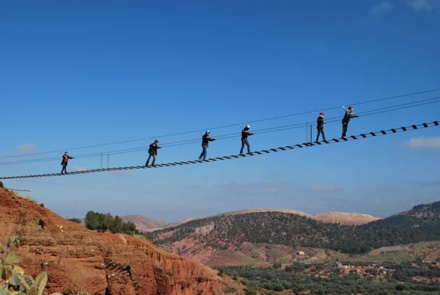 From Marrakesh: Zip-Line & Hike in the Atlas Mountains - Four zip-lines over pine forest and red-mud villages