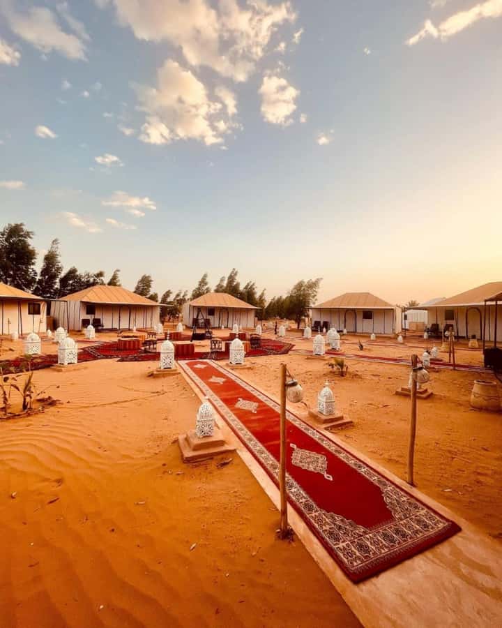 From Merzouga: Overnight Camel Trek over Erg Chebbi Dunes - Sunset, sandboarding, and open time in the dunes