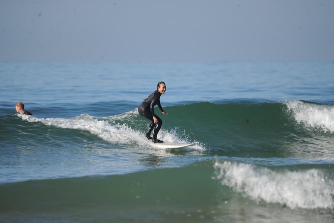 Learn to Surf with a Local - One Day Surf Experience - Starting at 10:00 a.m. with a search for the right wave
