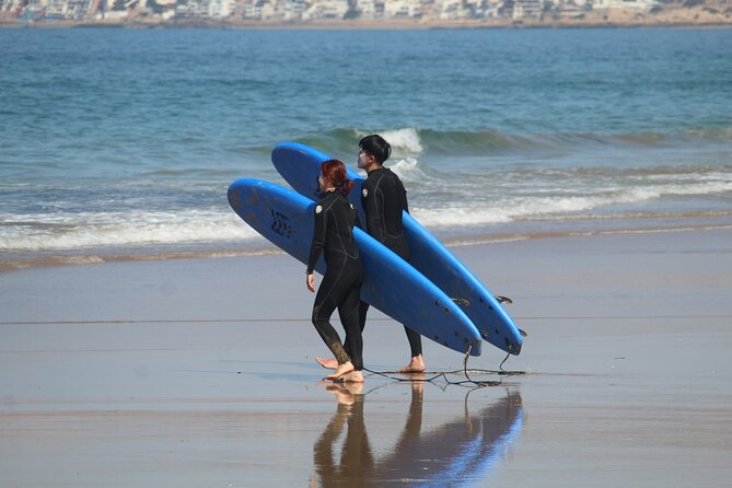 Learn to Surf with a Local - One Day Surf Experience - Booking, weather, and cancellation details