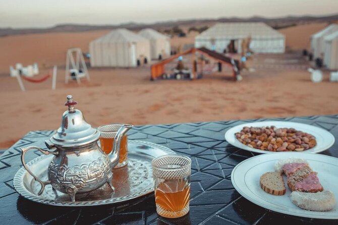 Luxury Camp in Merzouga Desert with Camel ride, Car 4WD - Tagine dinner, tea, and desert music