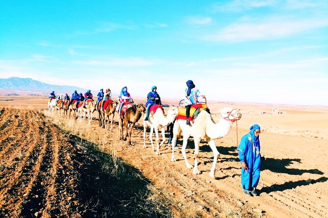 Magical dinner, sunset, music and fire show in Agafay desert - Camel ride or quad-bike fun
