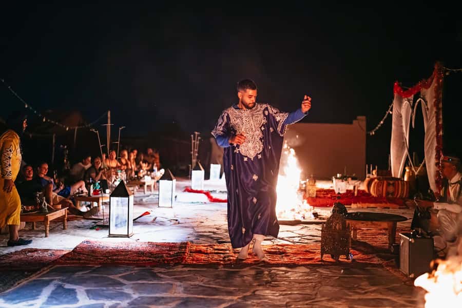 Marrakech: Agafay Desert Pool, Dinner & Live Show Experience - Sunset over rocky hills