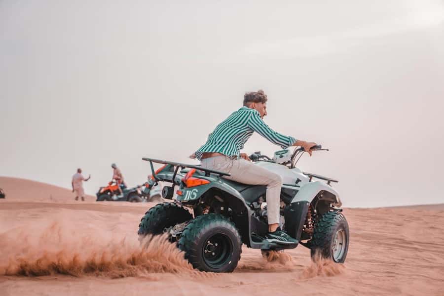 Marrakech: Agafay Desert Quad Bike with Camels & Dinner Show - Sunset views over Agafay and the Atlas Mountains