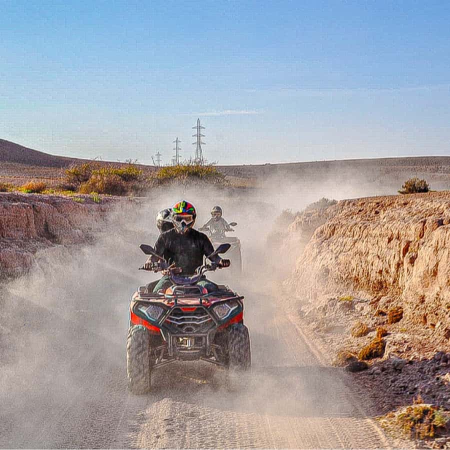 Marrakech: Agafay Desert Quad Biking, Camel Ride Fire Show - A 20-minute camel ride on rocky ground