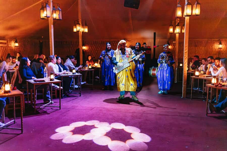 Marrakech: Agafay Desert Retreat, Tent, Dinner, Show & Pool - Dinner around the campfire