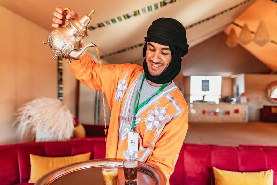 Marrakech: Agafay Desert Retreat, Tent, Dinner, Show & Pool - Welcome tea and your first look at the camp