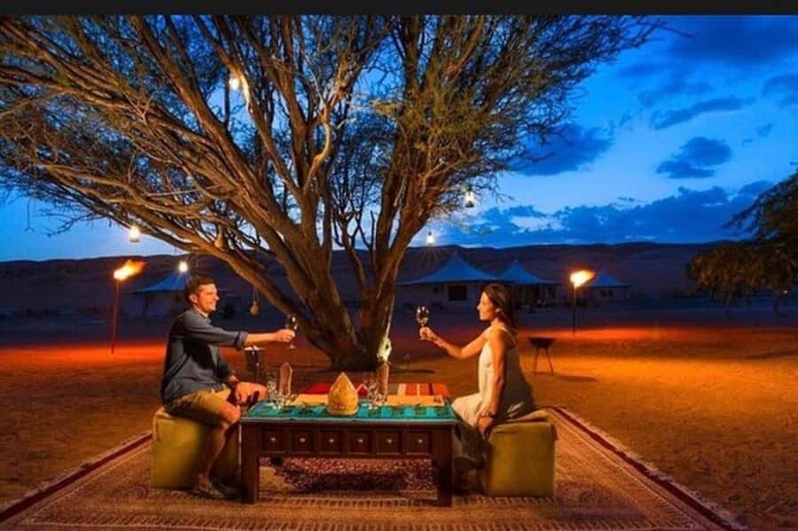 Marrakech : Agafay Desert Sunset Camel Ride & Luxury Dinner - Gnawa music, dancing, and the fire show