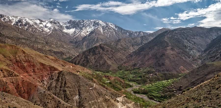 Marrakech: Atlas Mountain, Berber Villages, & Valleys Tour - Waterfalls, mint tea, and a family meal