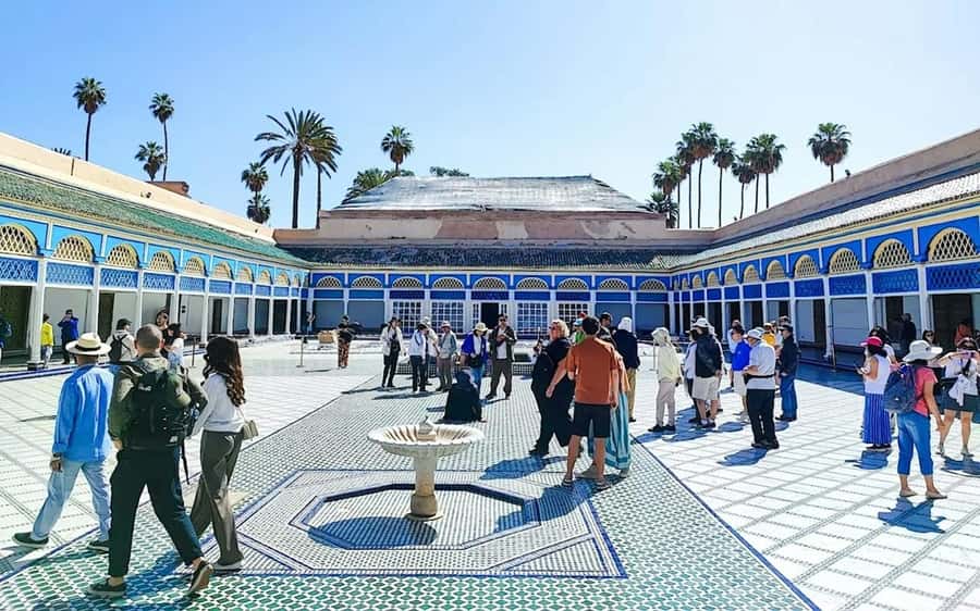 Marrakech: Bahia Palace, Saadian Tombs & Medina Walking Tour - Koutoubia Mosque begins the story