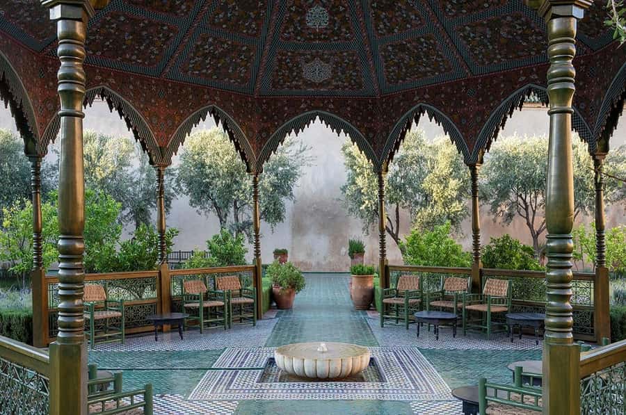 Marrakech: Ben Youssef, Secret Garden, & Souks Walking Tour - Ben Youssef Madrasa rewards close attention