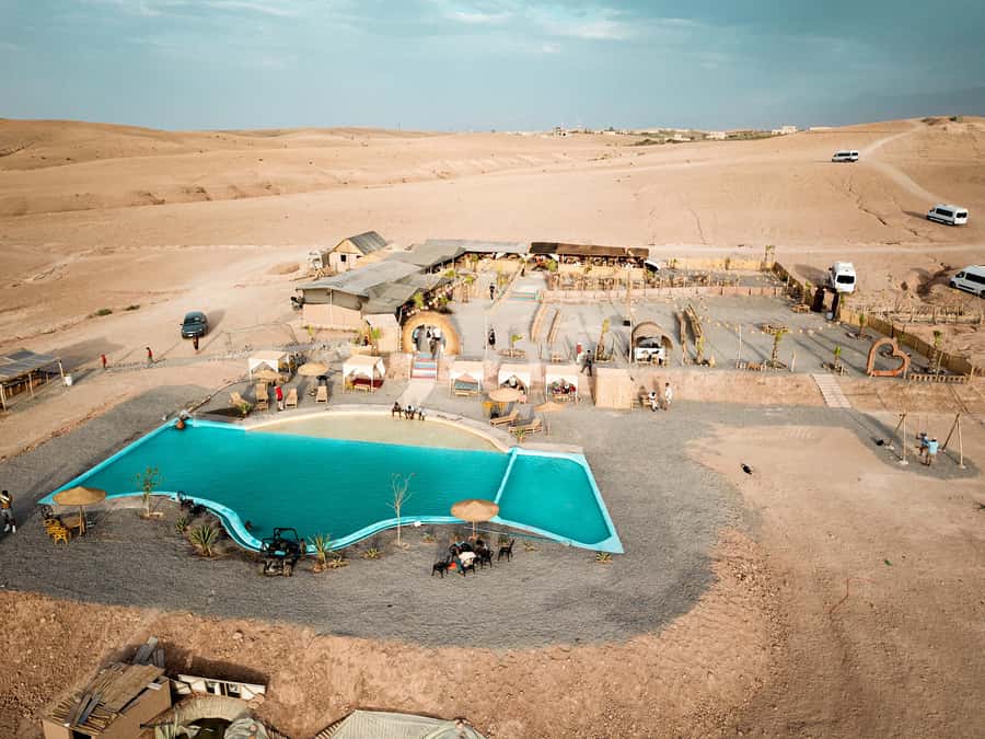 Marrakech: Camel Ride, Dinner, Pool, and Fire Show in Agafay - Live music, dancing, and a fire show