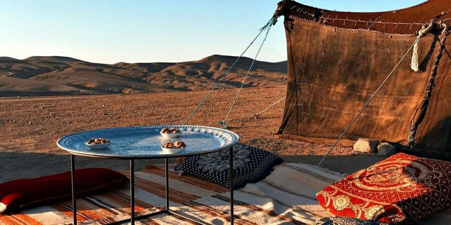 Marrakech: Camel Ride & Sunset Dinner with Fire Show - Arriving at the decorated Berber camp