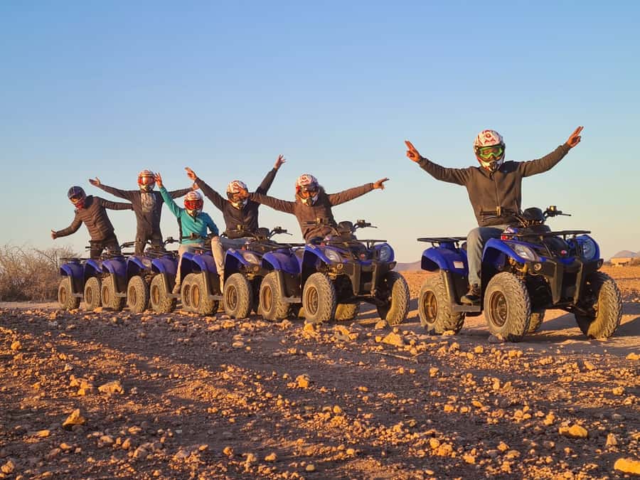 Marrakech: Desert and Palm Grove Quad Tour with Tea - Riding from the palm grove into rocky desert