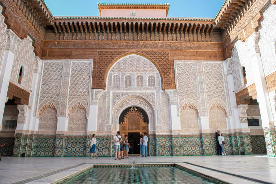 Marrakech: Madrasa Ben Youssef, Secret Garden & Medina Tour - What the guide adds to the experience