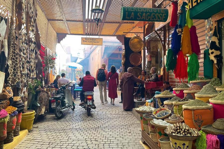 Marrakech: Medina and Souks Walking Tour - Shopping for Berber jewelry, rugs, and leather