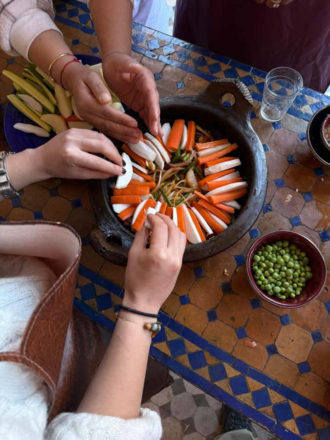 Marrakech: Moroccan Cooking Class with a Local Family - Cooking the starter: salads or briwat