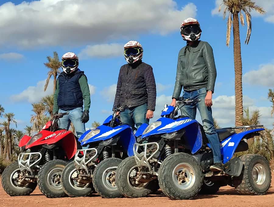 Marrakech: Quad Bike and Camel Ride Tour - A camel circuit with traditional clothing