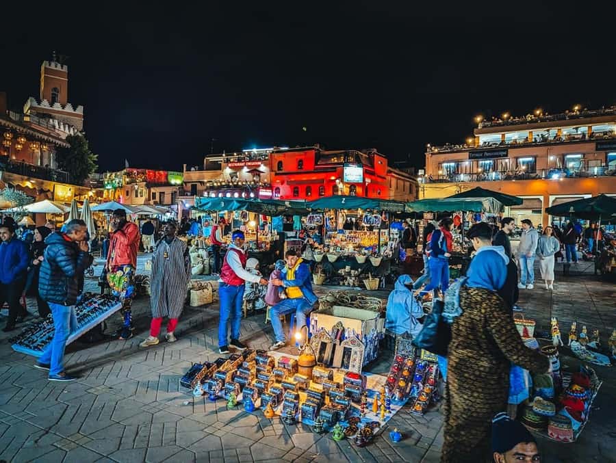 Marrakech: Souk by Night Medina Guided Walking Tour. - Tasting olives, fruit, bread, and tea
