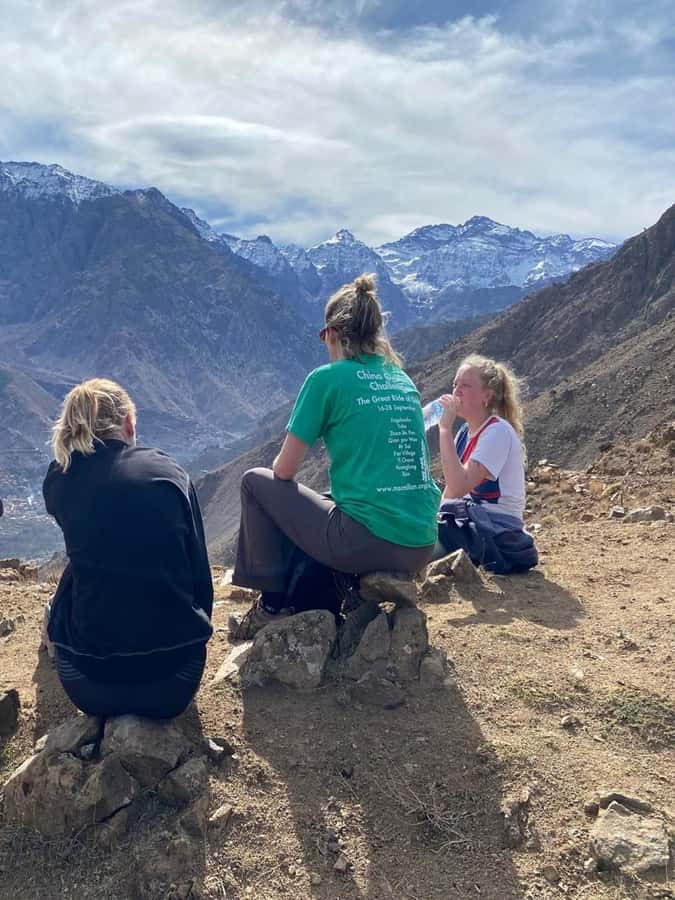 Marrakech: Tedli Summit Atlas Mountains Day Hike & Lunch - Returning through villages and toward the waterfall