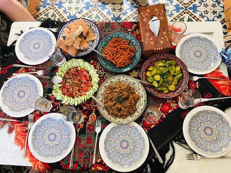Marrakech: Traditional Moroccan Cooking Class & Market Visit - The teaching style and group atmosphere
