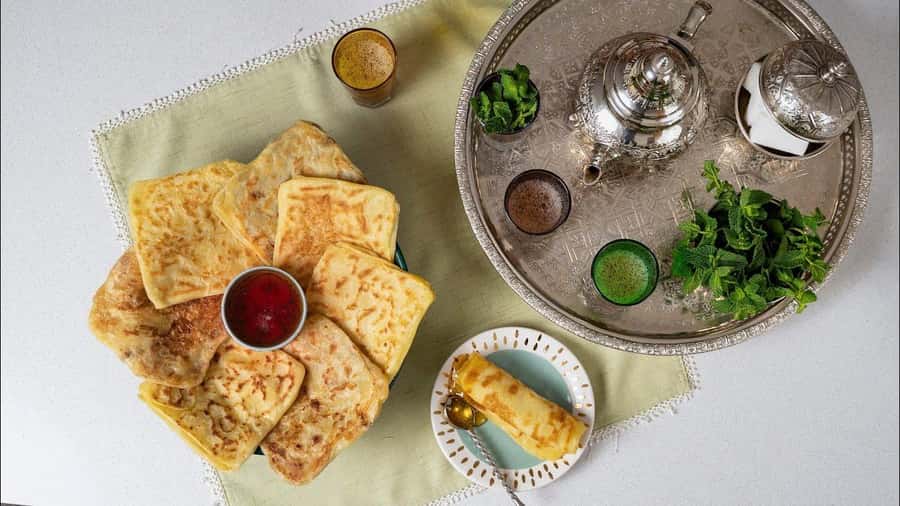 Marrakech: Traditional Moroccan Crepes & Bread Cooking Class - Language, teaching style, and group size