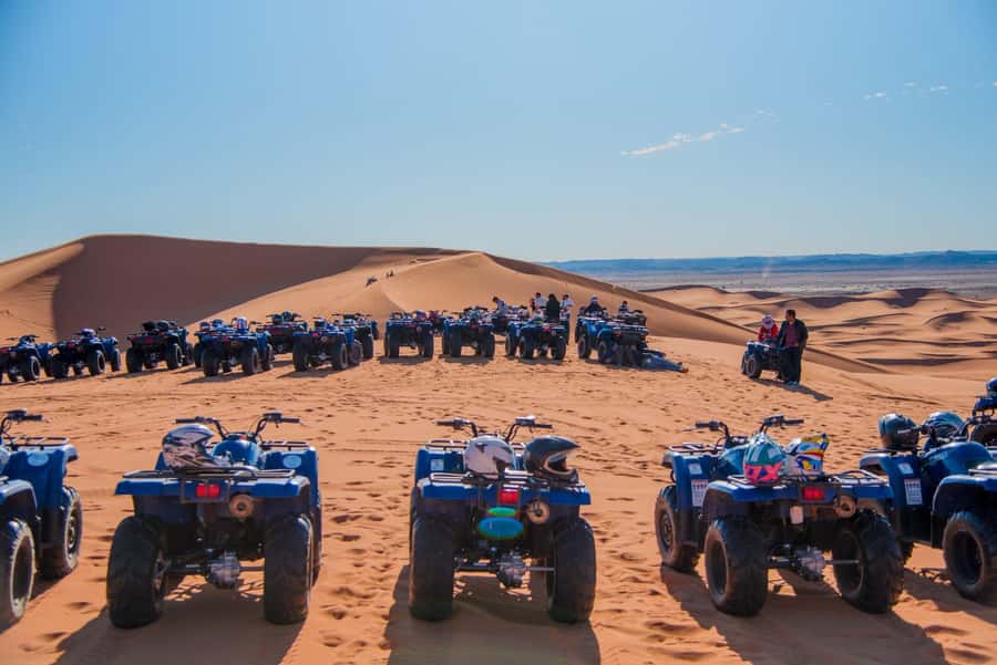 Merzouga : Adventure Quad Bike Safari, & Sandboarding - Riding across the Merzouga dunes