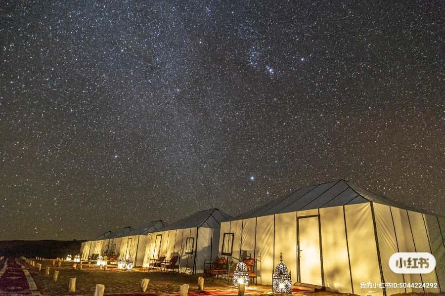 Merzouga: Overnight Stay in Luxury Desert Tent with Dinner - Berber drums, firelight, and the night sky